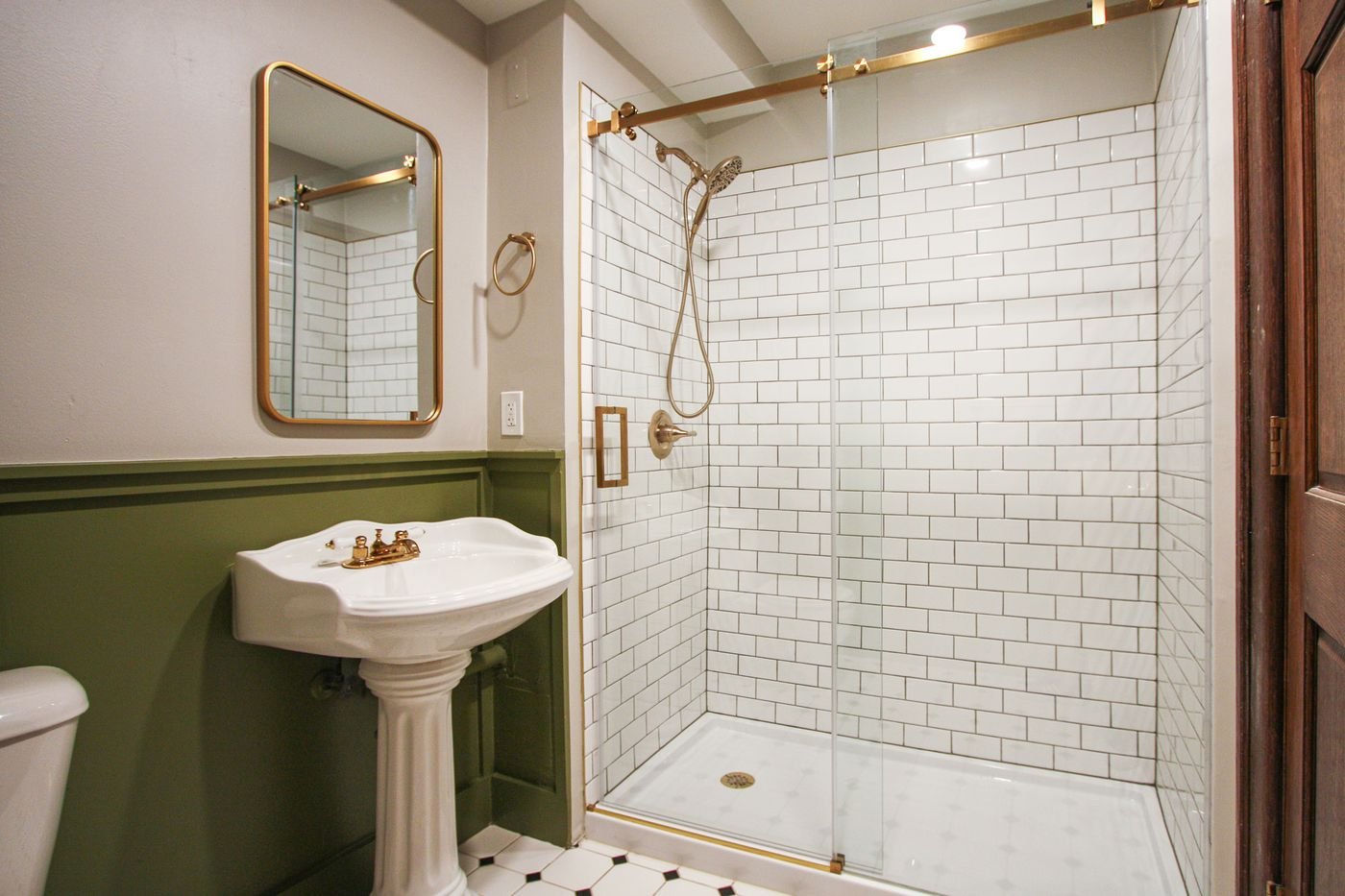 Bath with green wainscoting